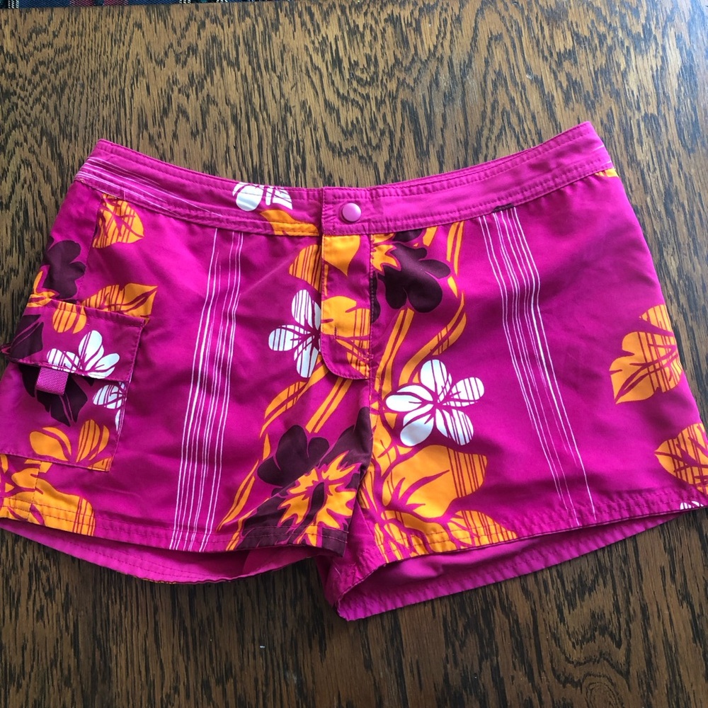 Hot pink reversible board shorts